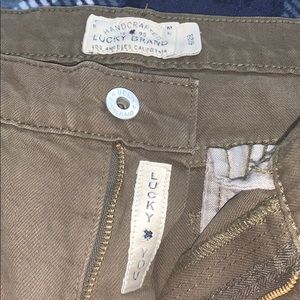 lucky brand army green ripped jeans